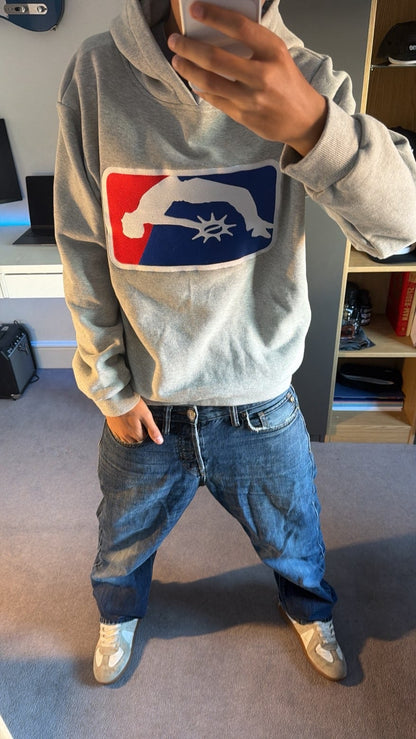 Solaire Hoodie in grey worn in a mirror selfie, front view